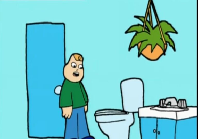 tom looking at toilet 1